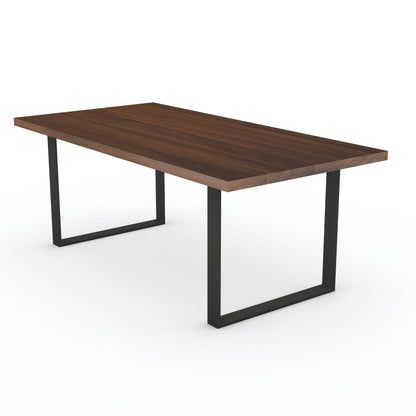 Braun gewachster Esstisch aus Eiche mit U-förmigem Fuß von Wildwuchs-Möbel, elegant und modern im Design.