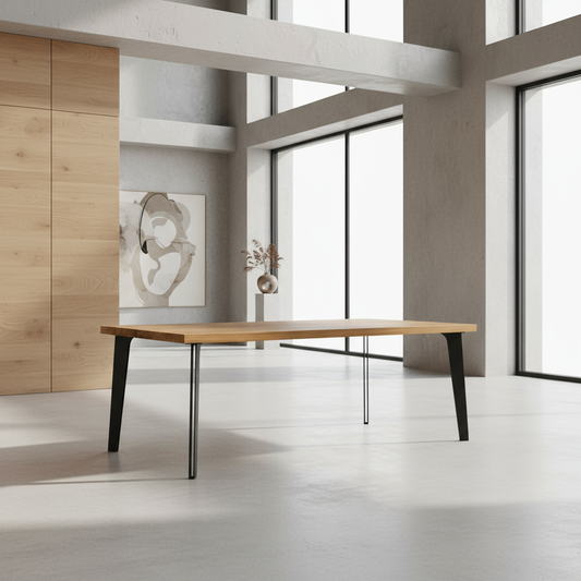 Esstisch aus gewachster Eiche mit massivem Stahlfuß in modernem Design von Wildwuchs-Möbel.