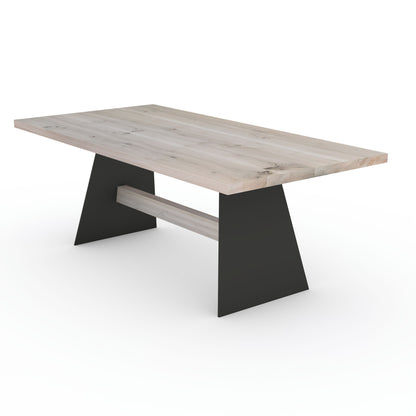 Rustic gray oak dining table by Wildwuchs-Möbel featuring a sturdy wood and steel crossbeam base.