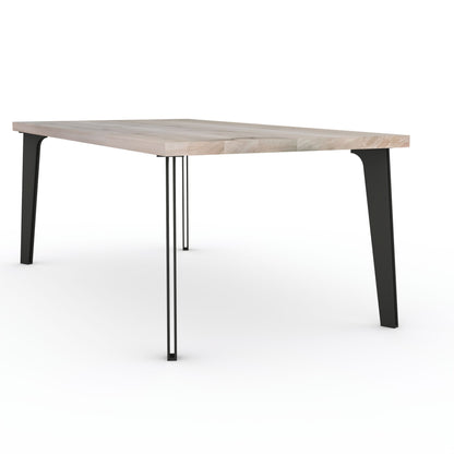 Rustic gray oak dining table by Wildwuchs-Möbel with solid steel "hollow leg" support, showcasing natural wood grain.